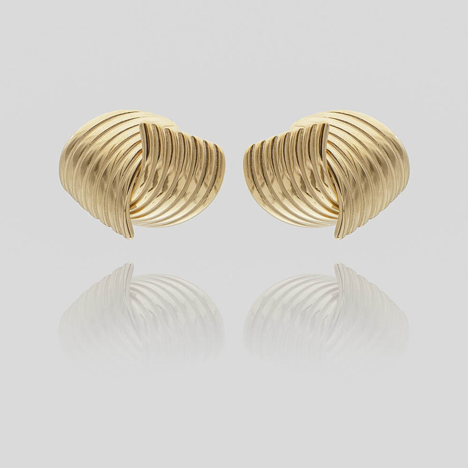 Amaya Gold Stud Earrings, crafted in 18k Gold plated Stainless steel,features two textured fluted fan motif from prya