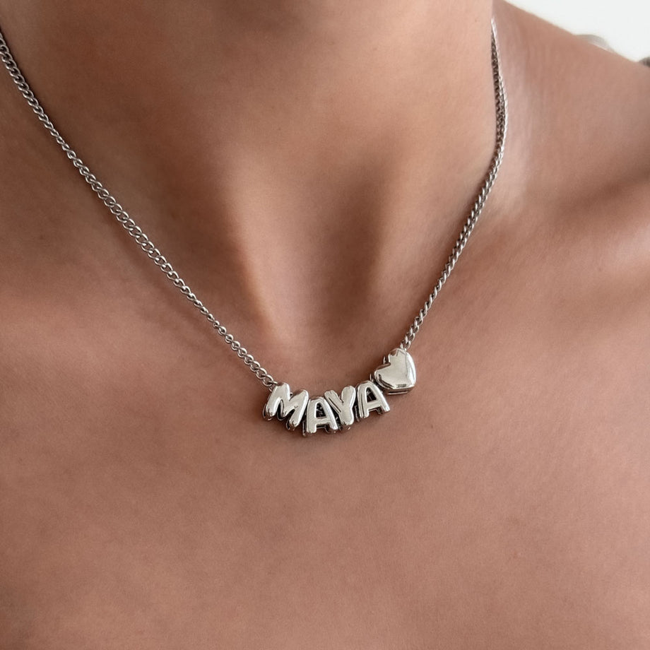 model wearing personalised bubble charm necklace from prya