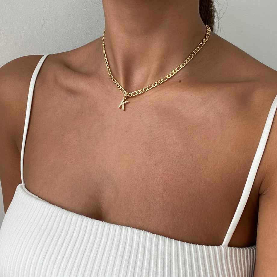 model wearing ICY Initial Necklace Figaro available in Gold or Silver Plated, A-Z initials from Prya