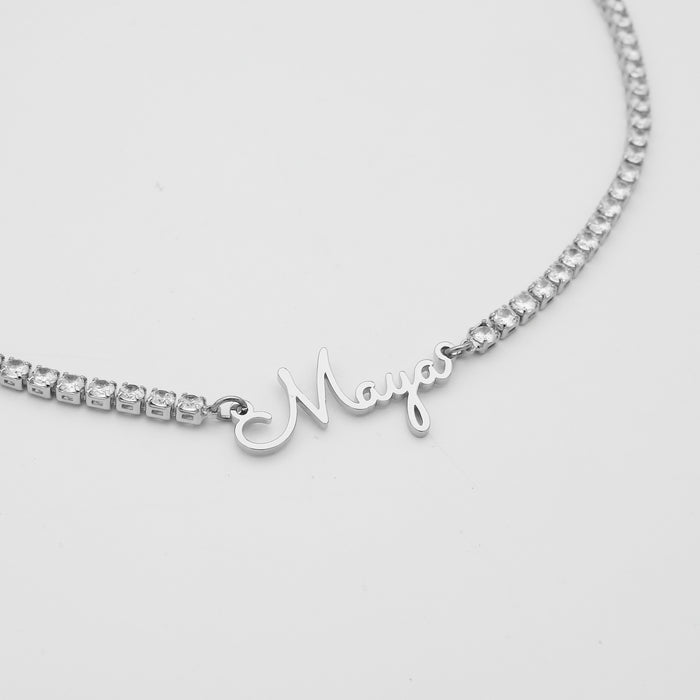 close up of icy custom name necklace in silver from prya