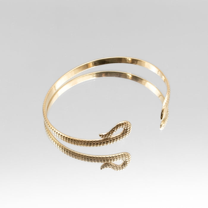 image of gold textured snake bangle from prya