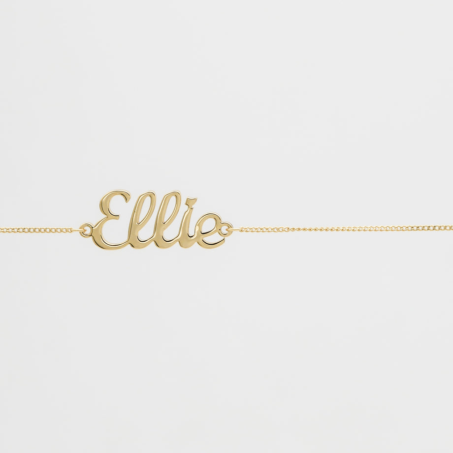Gold chain with "Ellie" nameplate.