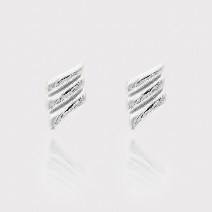 Silver Zaya ribbed Earrings on white background.