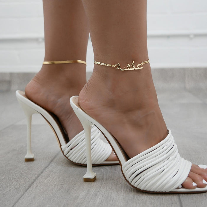 model wearing gold arabic custom name anklet from prya