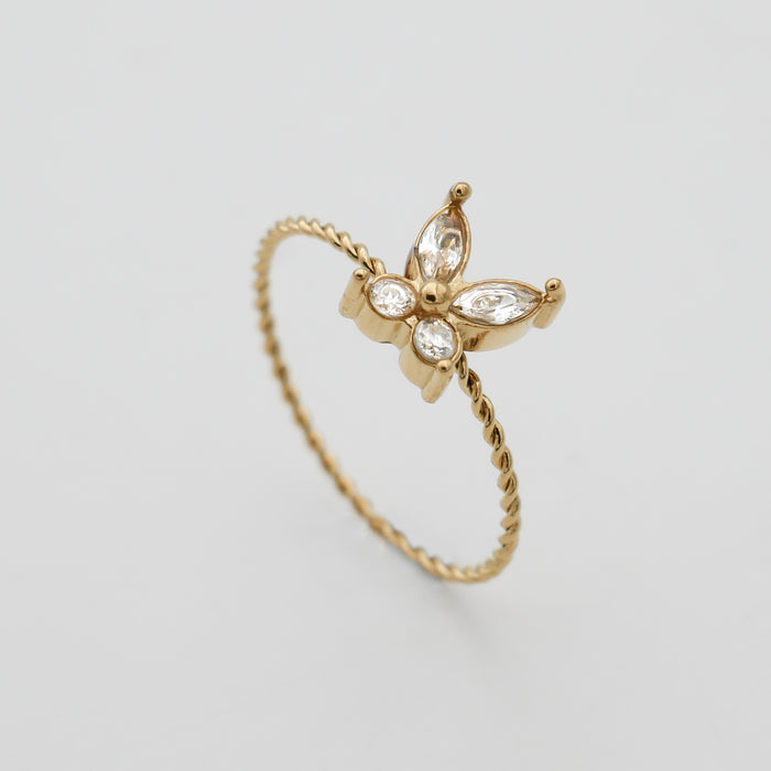 Gold butterfly ring with delicate details.