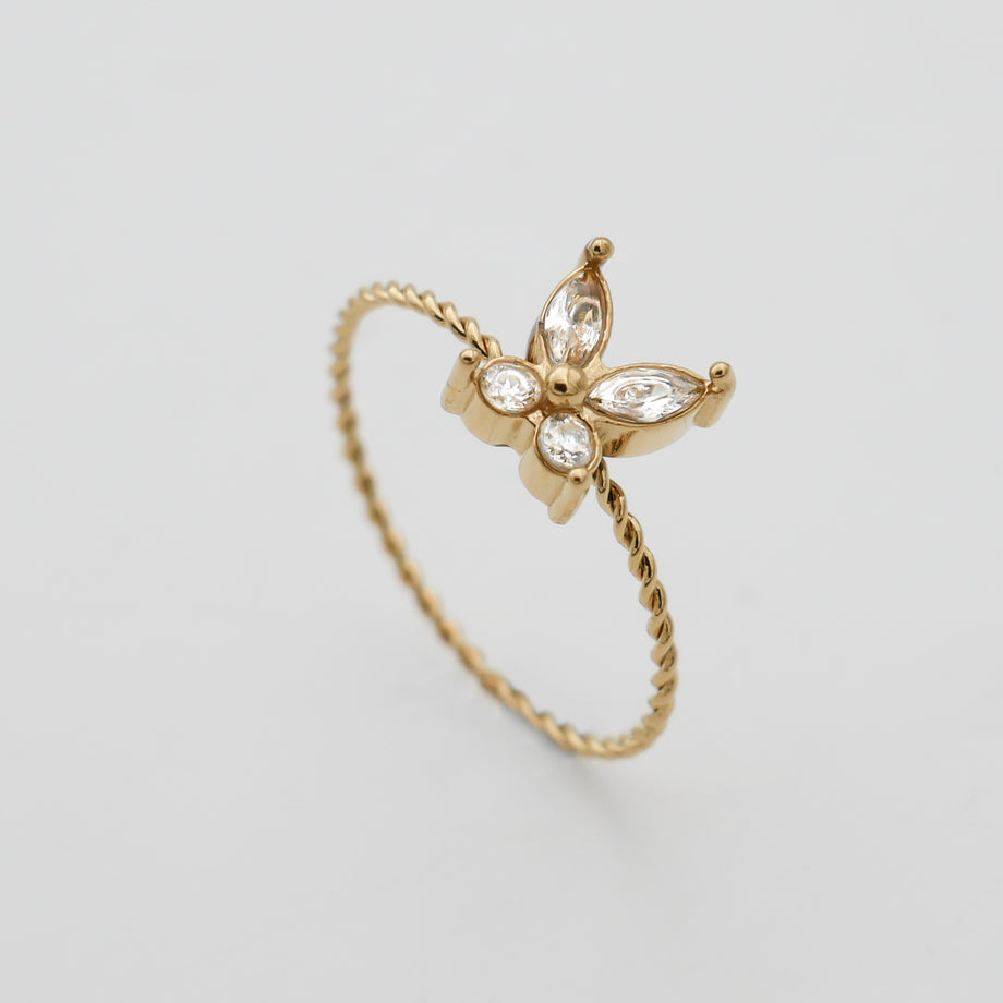 Gold butterfly ring with delicate details.