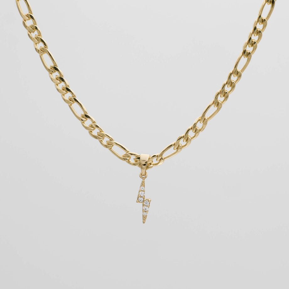 Gold chain with lightning bolt pendant.