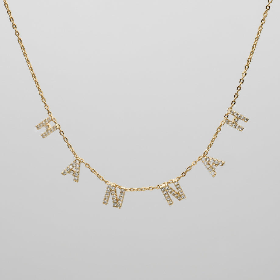 icy suspended custom name necklace in gold from prya