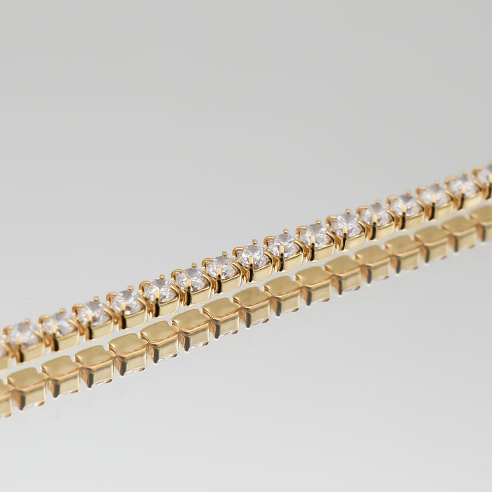 close up of the Icy tennis cz bracelet in gold