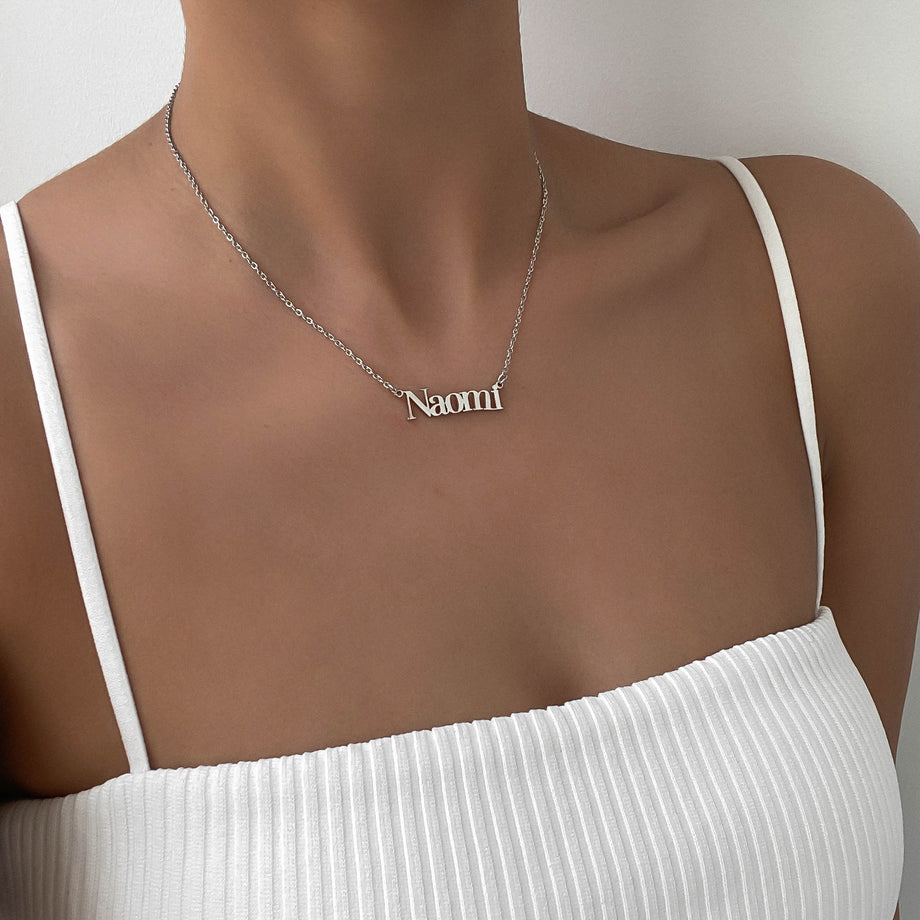model wearing personalised name necklace in silverfrom prya