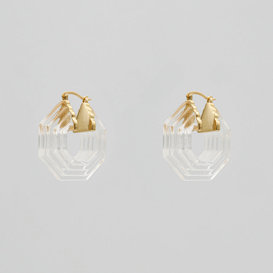 Gold and clear geometric earrings.