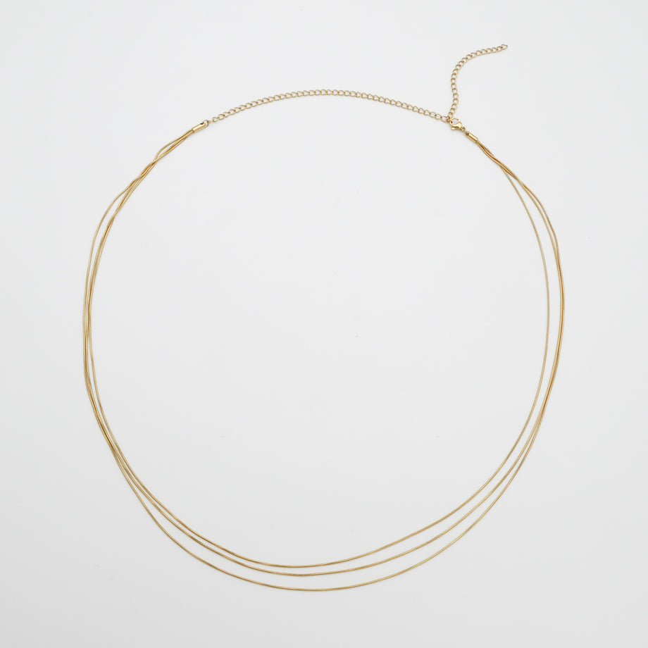 aaliyah triple belly chain in gold