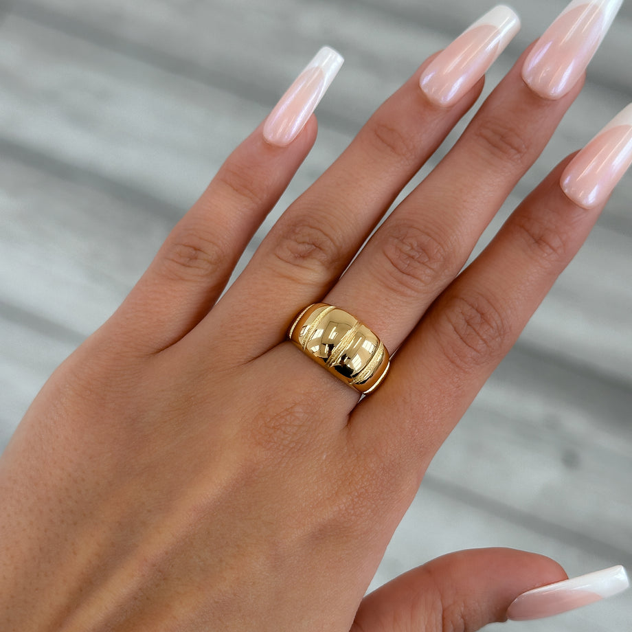 model wearing Alessia Chunky Ribbed Ring, engraved ribbed band crafted in 18k gold plated stainless steel from prya