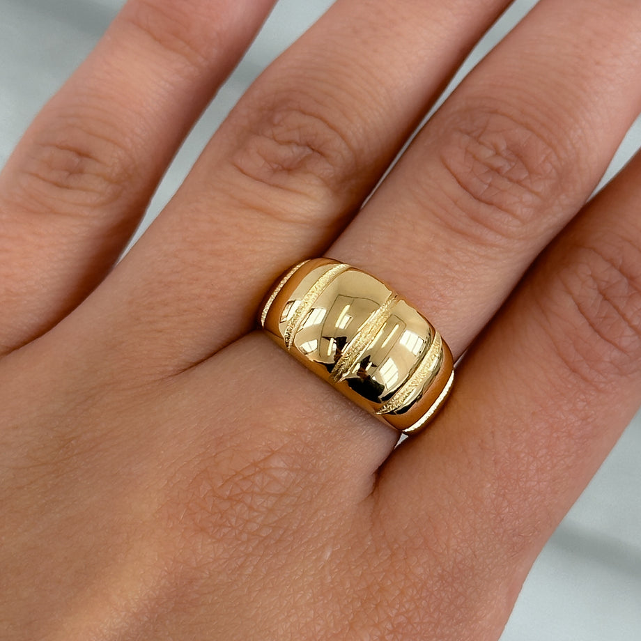 model wearing Alessia Chunky Ribbed Ring, engraved ribbed band crafted in 18k gold plated stainless steel from prya