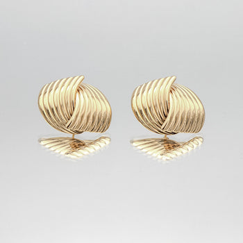 Amaya Gold Stud Earrings, crafted in 18k Gold plated Stainless steel,features two textured fluted fan motif from prya