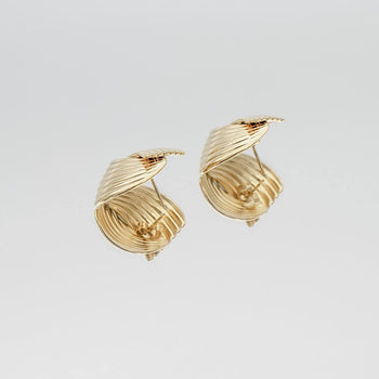 Amaya Gold Stud Earrings, crafted in 18k Gold plated Stainless steel,features two textured fluted fan motif from prya