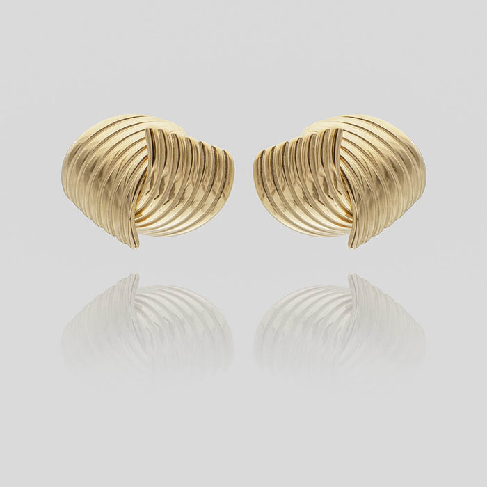 Amaya Gold Stud Earrings, crafted in 18k Gold plated Stainless steel,features two textured fluted fan motif from prya