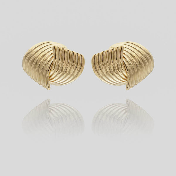 Amaya Gold Stud Earrings, crafted in 18k Gold plated Stainless steel,features two textured fluted fan motif from prya