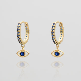 gold evil eye huggie earring paved with sapphire