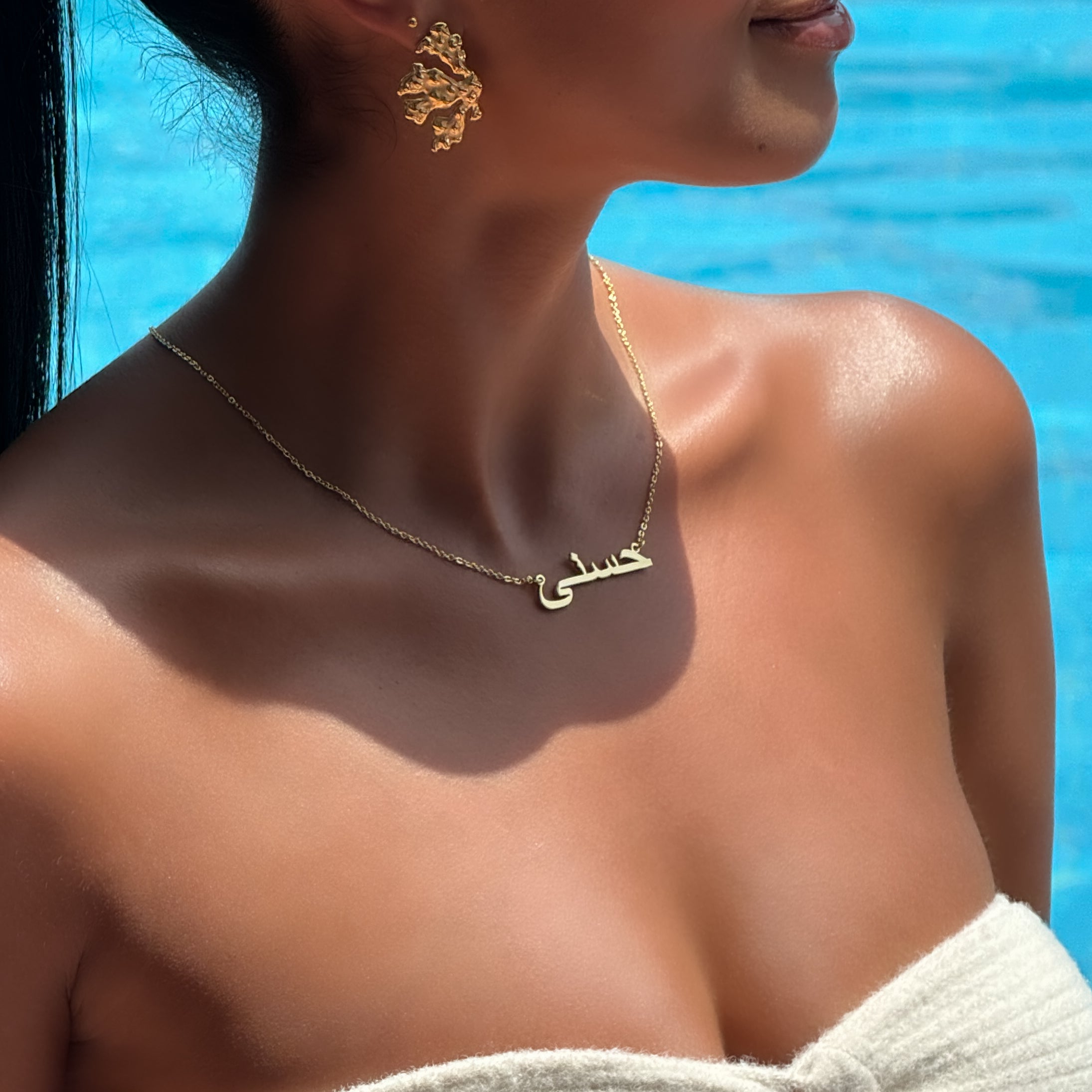 Model wearing our Gold custom Arabic name necklace from PRYA jewellery personalised UK