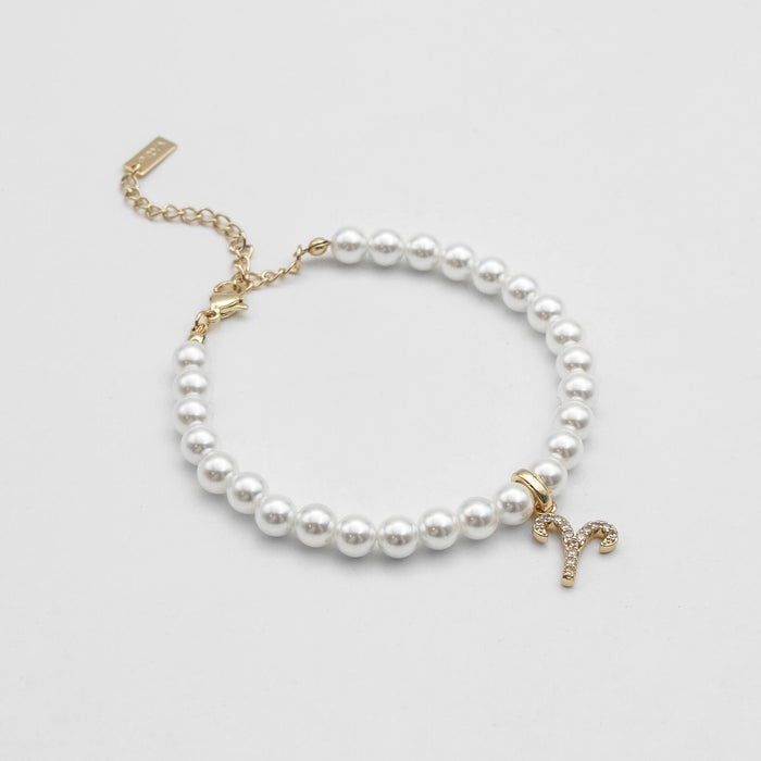 Gold-accented pearl anklet with zodiac aries charm, 