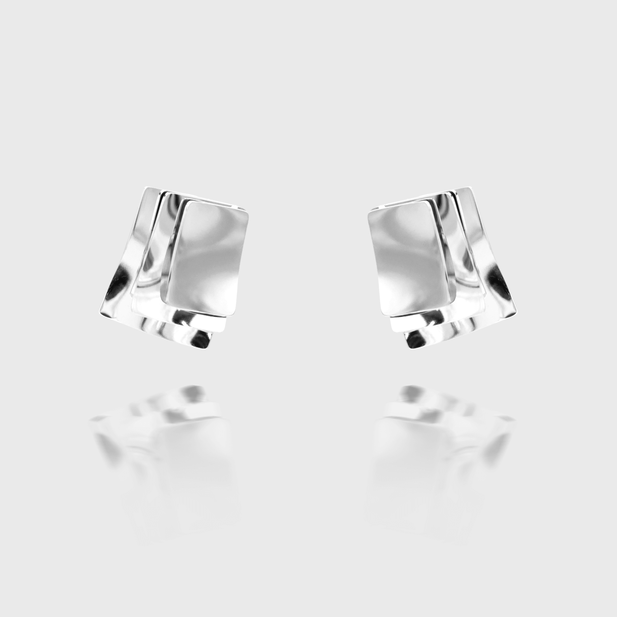 Arya Earrings crafted in silver plated stainless steel, featuring a striking three-layered square design from prya