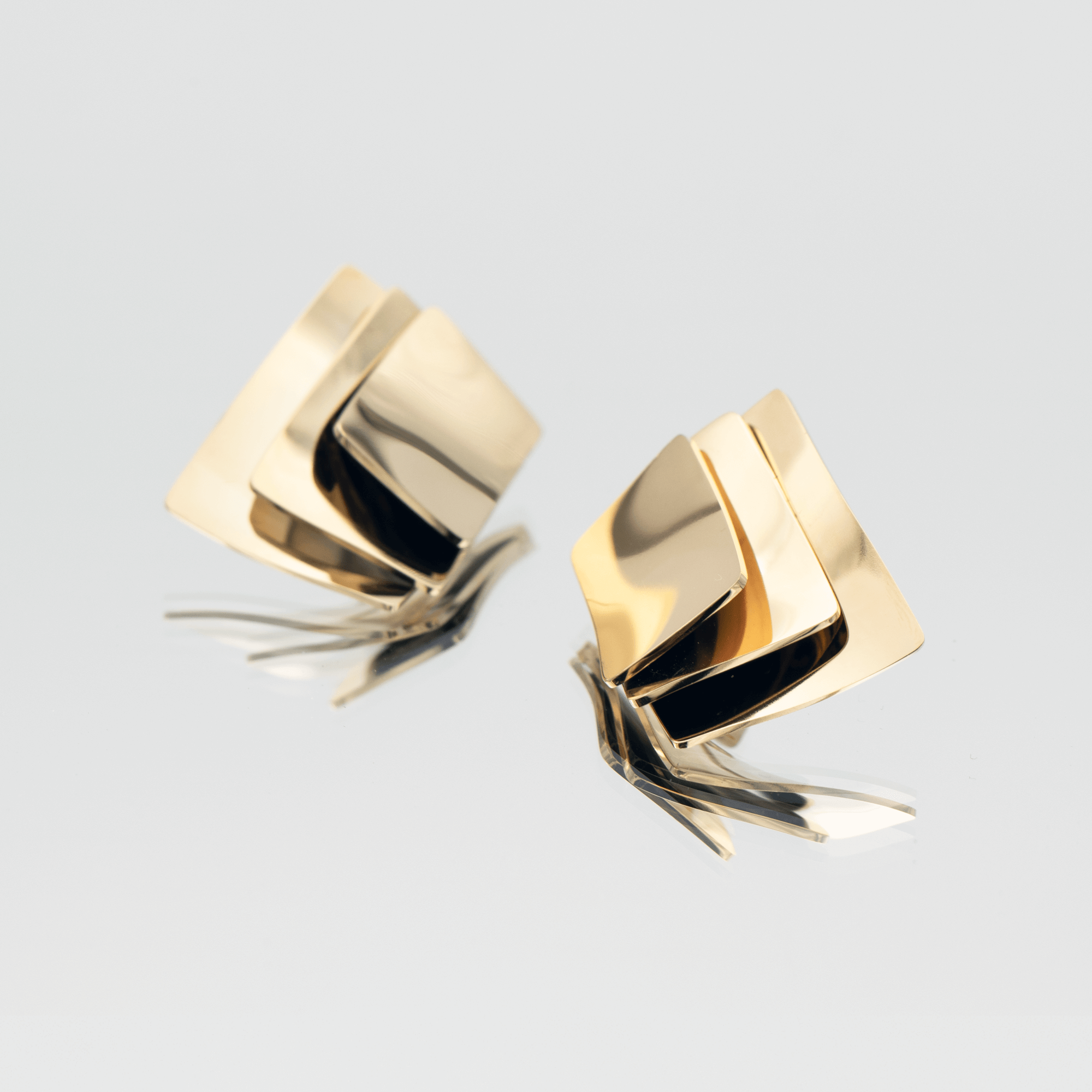 Arya Earrings crafted in 18k gold plated stainless steel, featuring a striking three-layered square design from prya