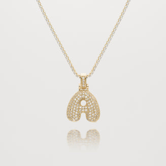 Pave Bubble Letter Initial Necklace encrusted with radiant CZ stones in gold tennis chain