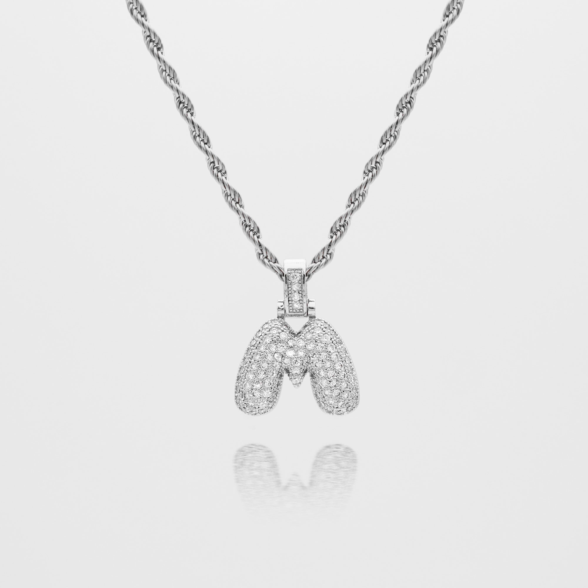Pave Bubble Letter Initial Necklace encrusted with radiant CZ stones in silver rope chain