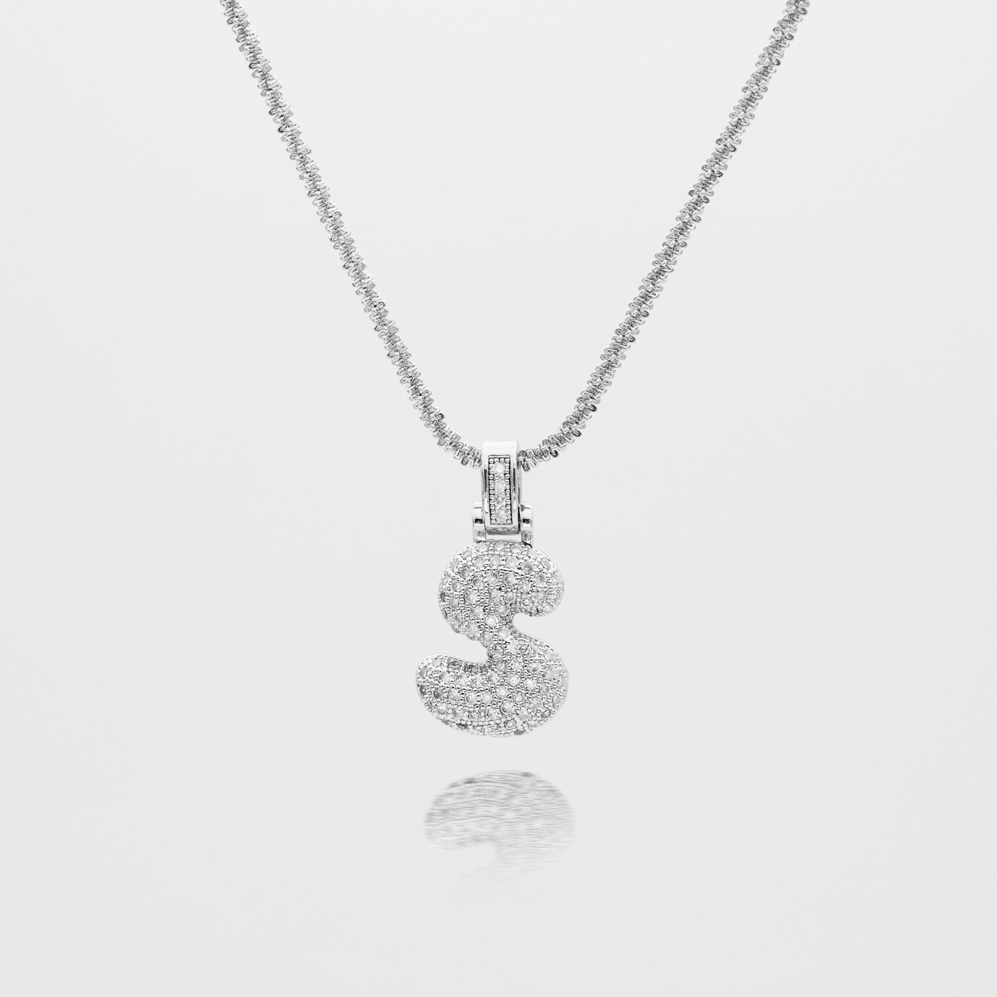 Pave Bubble Letter Initial Necklace encrusted with radiant CZ stones in silver tennis chain