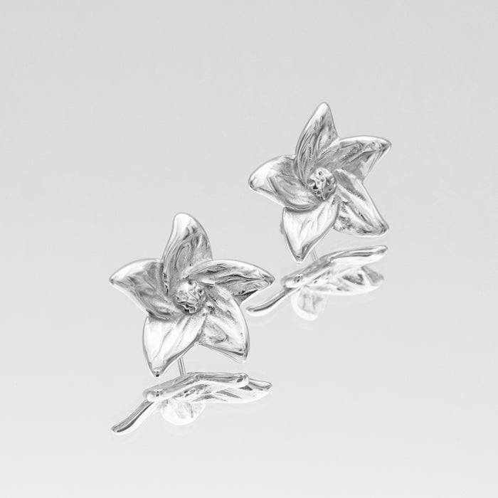 Camilla Flower Earrings feature a stunning design inspired by beautiful lilies, crafted in silver plated stainless steel