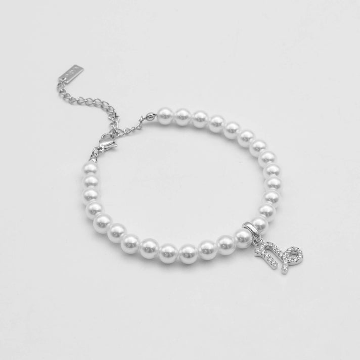 silver-accented pearl anklet with zodiac capricorn charm, 