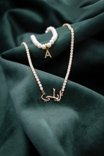 Icy Arabic name necklace and icy initial pearl bracelet from prya