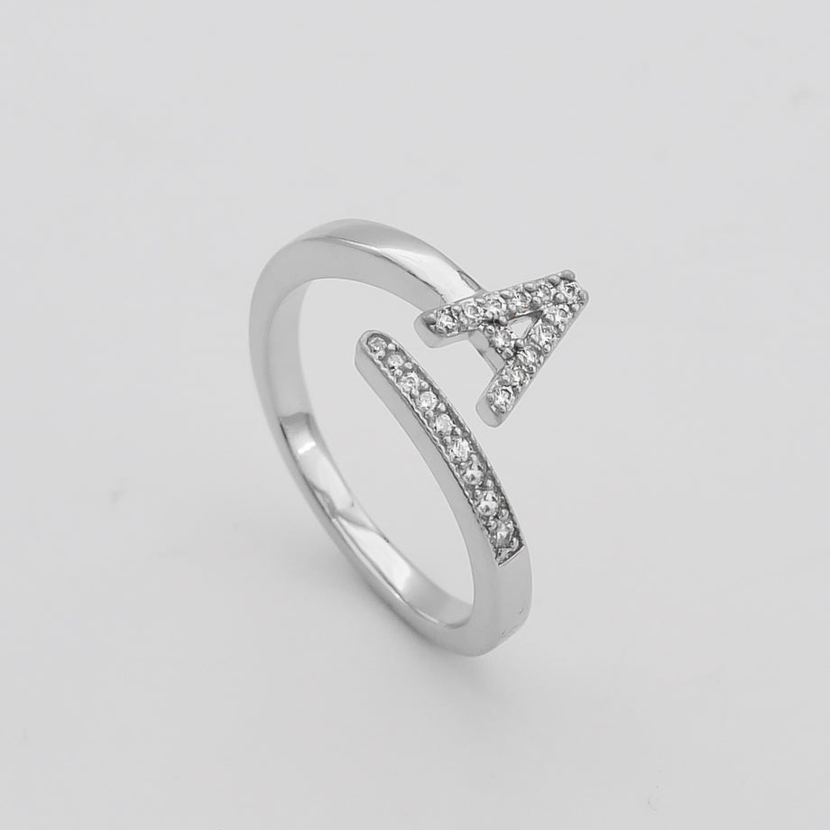 Model wearing Silver Paved, adjustable Icy initial ring in A