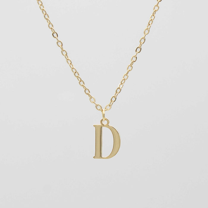 18k gold plated initial necklace featuring a 'D' pendant on a classic chain for personalized elegance.