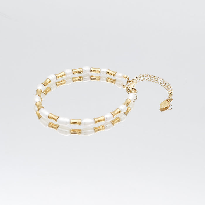 The Eden Pearl Bead bracelet, features delicate gold plated bamboo shaped beads and lustrous pearls from PRYA