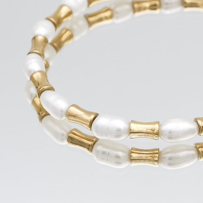 The Eden Pearl Bead bracelet, features delicate gold plated bamboo shaped beads and lustrous pearls from PRYA