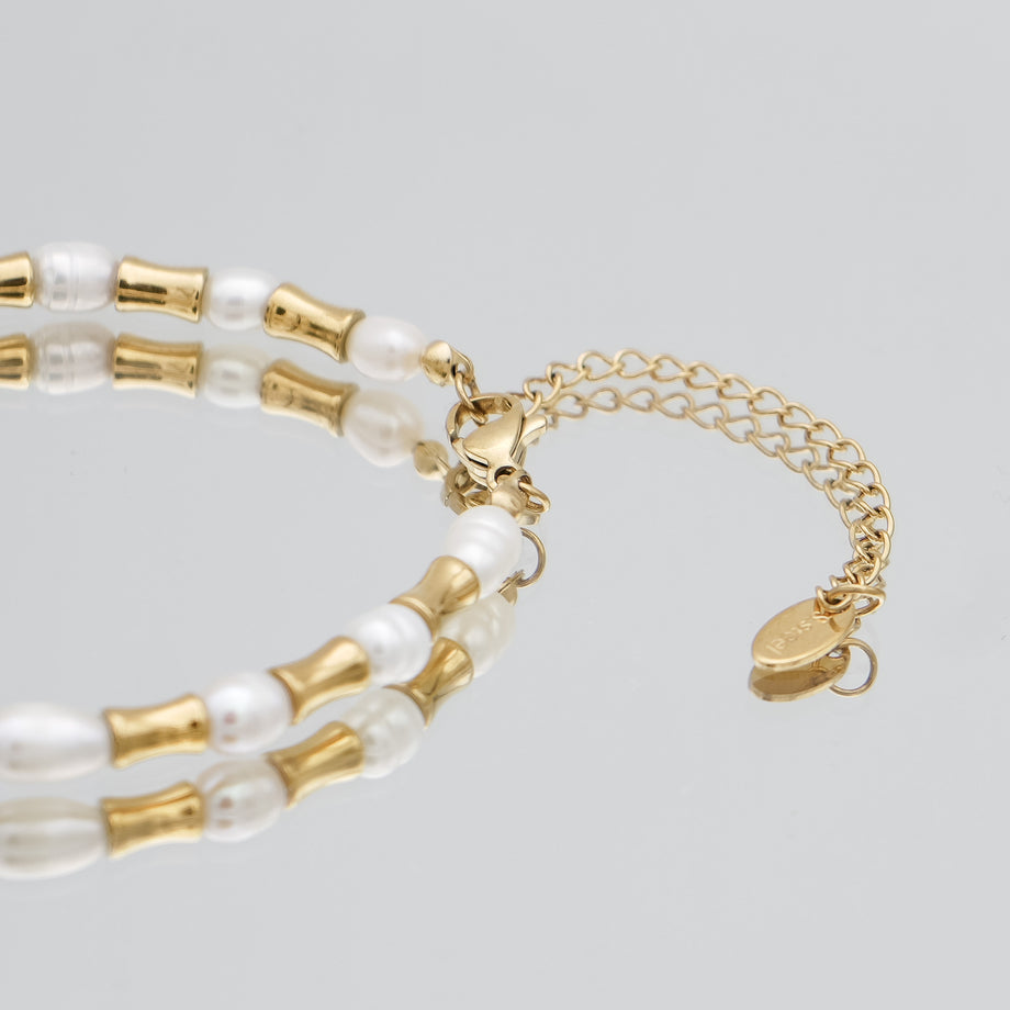 The Eden Pearl Bead bracelet, features delicate gold plated bamboo shaped beads and lustrous pearls from PRYA