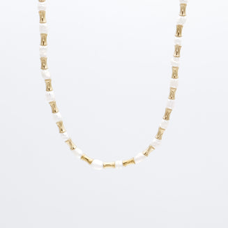 The Eden Pearl Bead Necklace, features delicate gold plated bamboo shaped beads and lustrous pearls from PRYA