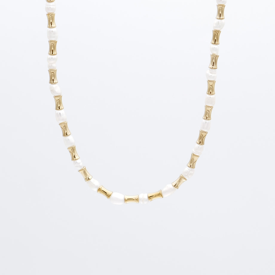 The Eden Pearl Bead Necklace, features delicate gold plated bamboo shaped beads and lustrous pearls from PRYA