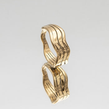 Esme Gold Ring featuring a chunky style with a triple wave band design from Prya