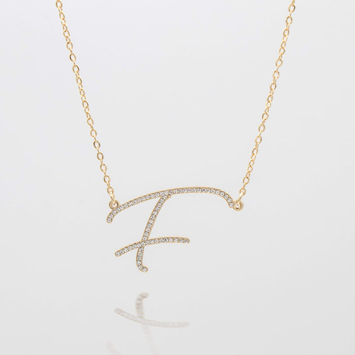 sydney initial necklace with letter 'f' in gold from prya
