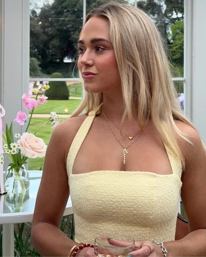 bridesmaid wearing personalised necklace
