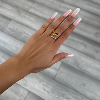 model wearing Gianna Wrap Ring, double cross over wrap ring, crafted in 18k gold plated stainless steel from prya