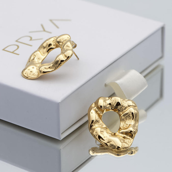 The Gizelle Gold Earrings, crafted in 18K gold plated stainless steel features molten loop texture from Prya