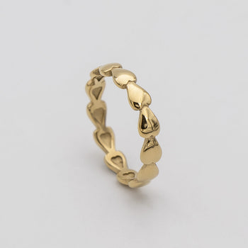 Harper Gold plated dainty Ring featuring a charming row of hearts, perfect for ring stacking 