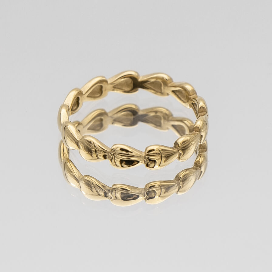 Harper Gold plated dainty Ring featuring a charming row of hearts, perfect for ring stacking 