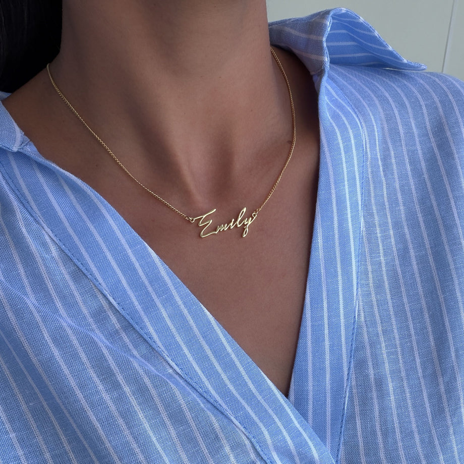 model wearing Havana personalised name necklace in 18k gold plated stainless steel from prya