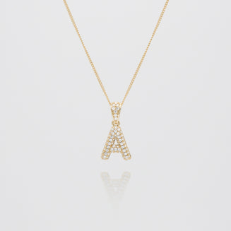 icy mini bubble initial necklace in 18k gold or silver plated, in mini curb, tennis and rope chain from prya