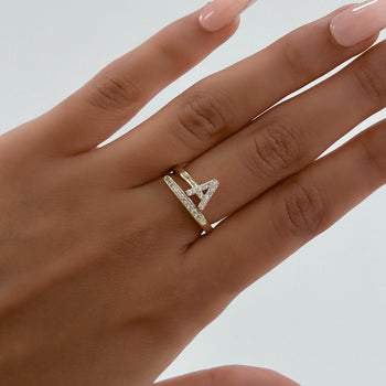 Model wearing Gold Paved, adjustable Icy initial ring